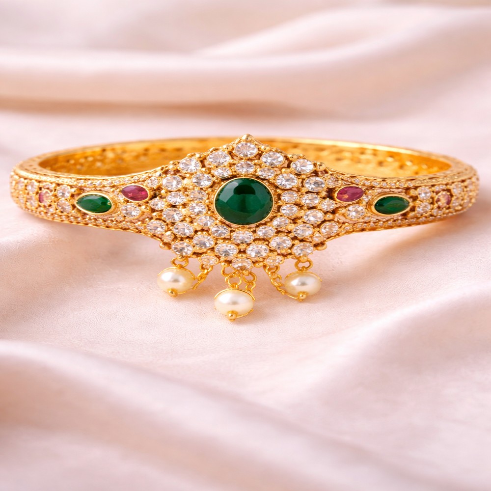 Ornate gold bracelet with emerald stone_1000x1000